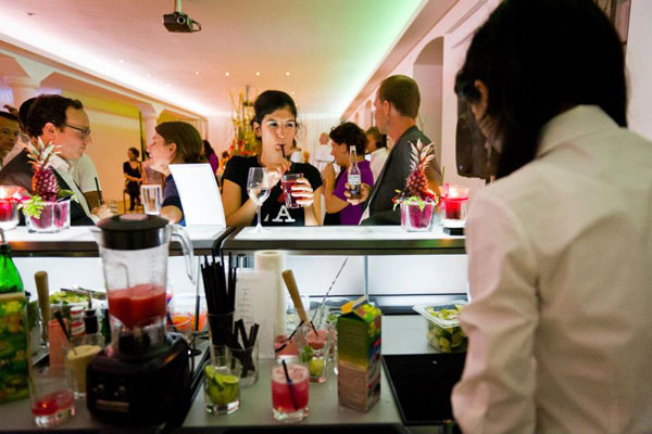 Bartender preparing cocktails in mobile bar